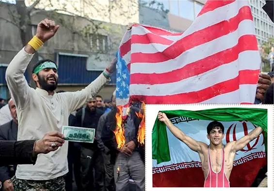 Iranian protesters burn an American flag during a demonstration following the US State Department’s visa denial for Iran’s wrestling federation head, Alireza Dabir.